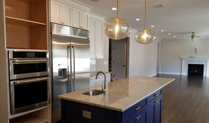 open design where kitchen flows into family area in Wyckoff, New Jersey