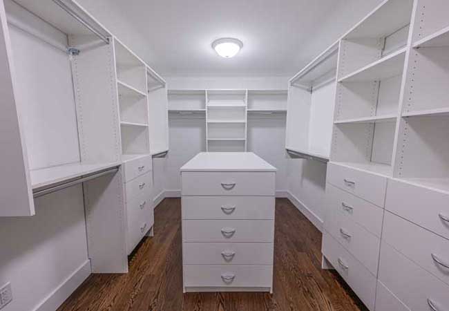 Custom closet built-ins in master bedroom