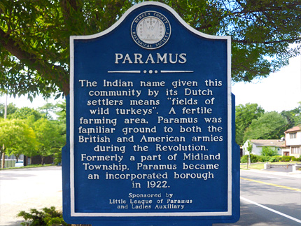A stone block describing the history of Paramus, New Jersey.